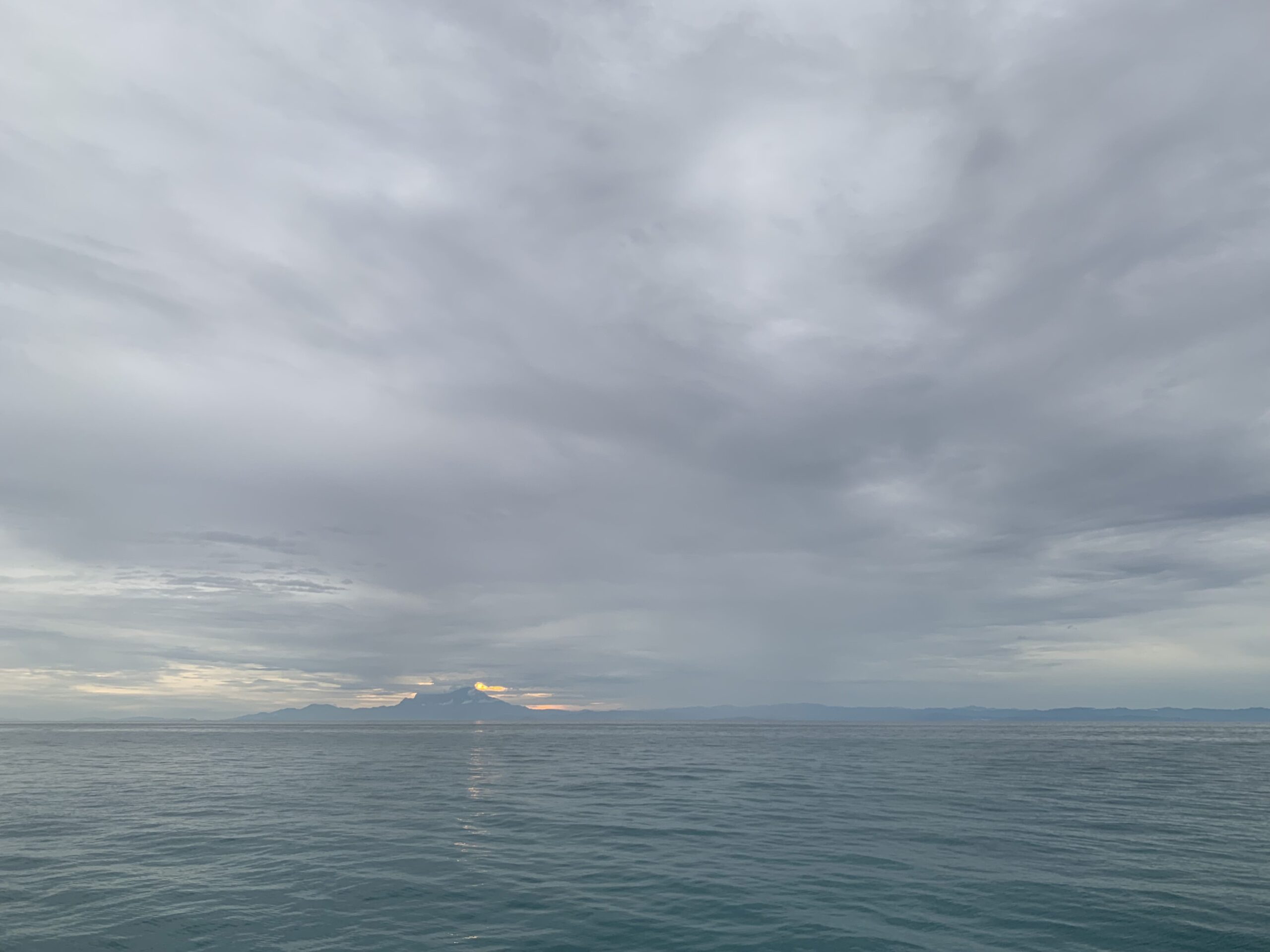 Morning Sunrise with Mount Kinabalu onboard Mawali Sailing